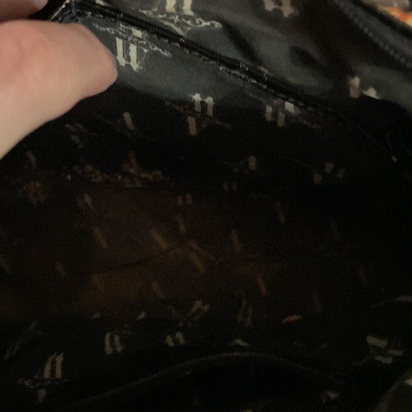 American West shoulder bag.  Black in color with silver accents. - Picture 7 of 7